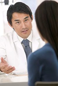 Cancer doctor in consultation.